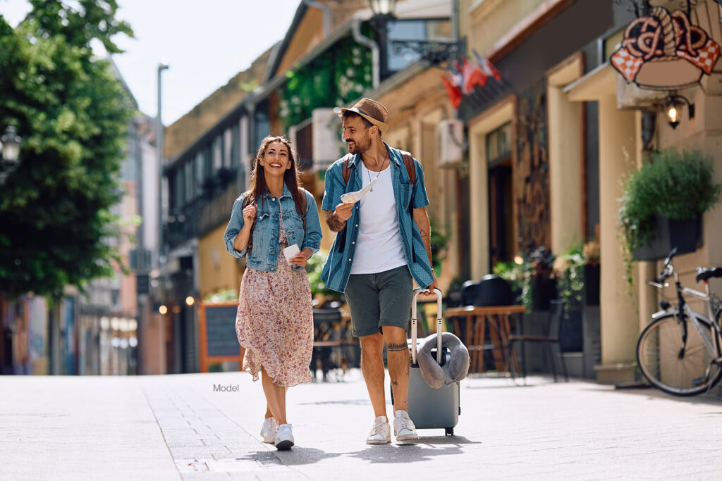 Couple with luggage traveling